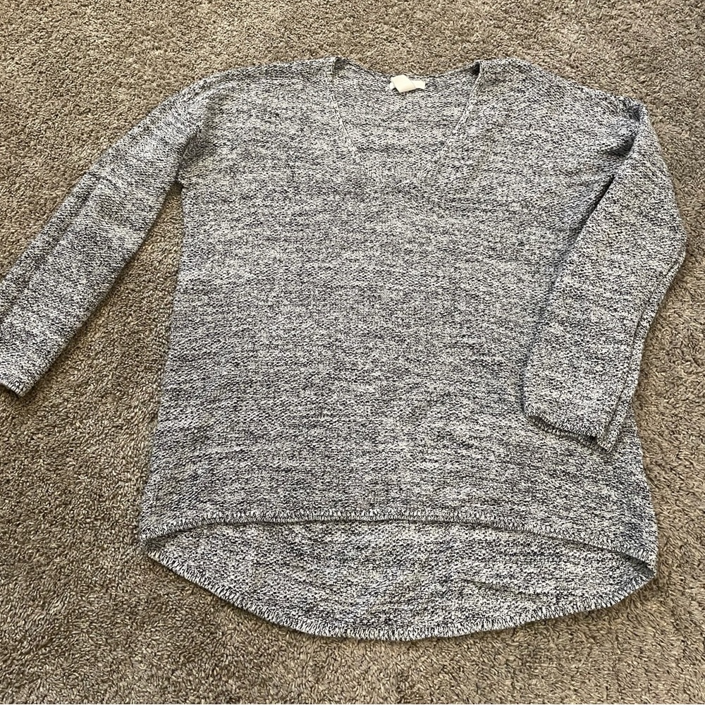 Black and white heathered sweater.